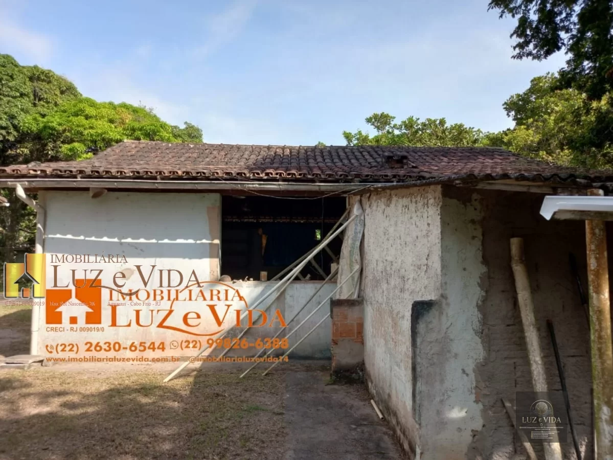 Venda dessa área com casas dentro