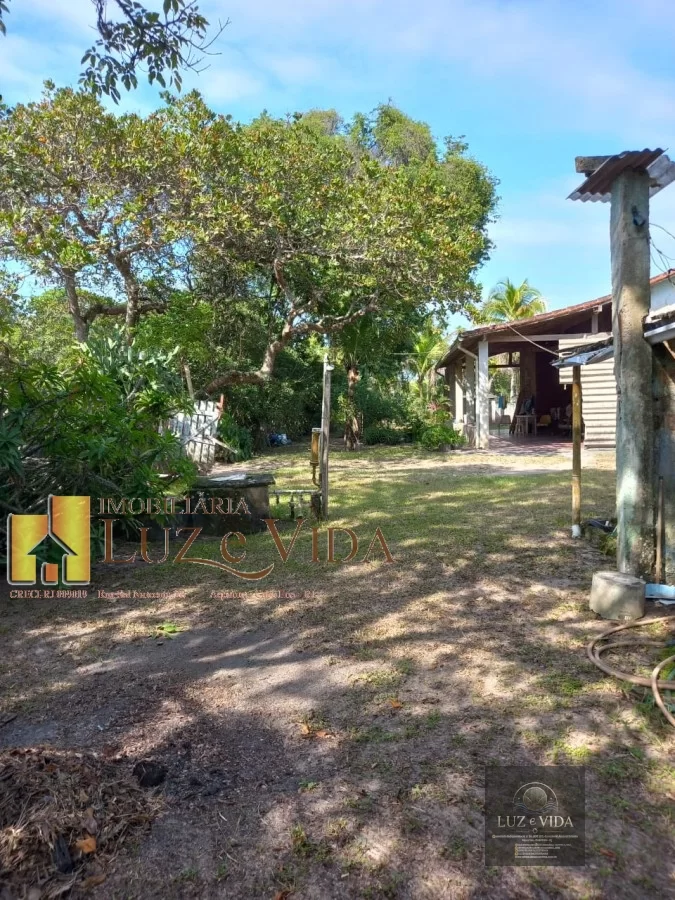 Venda dessa área com casas dentro