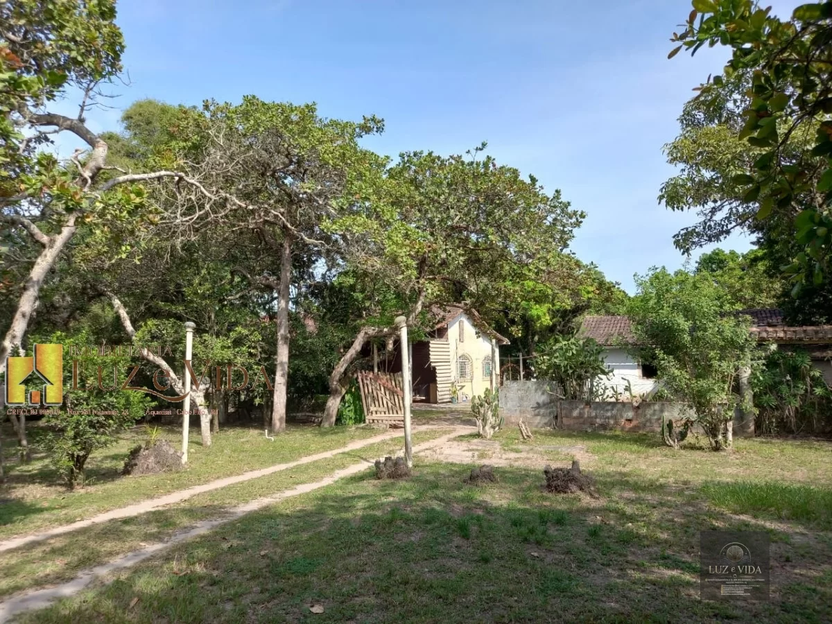 Venda dessa área com casas dentro