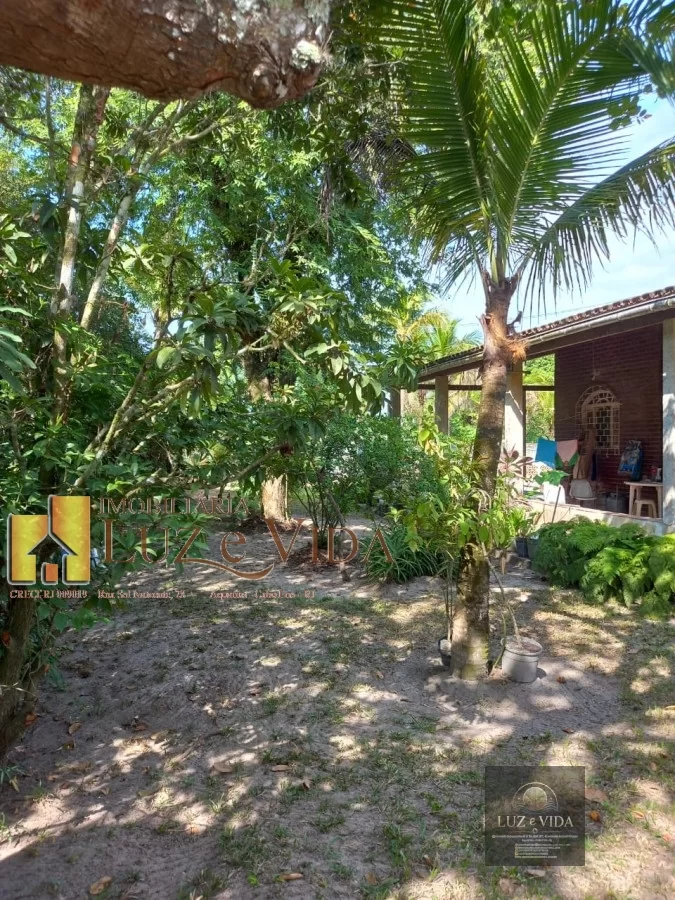 Venda dessa área com casas dentro