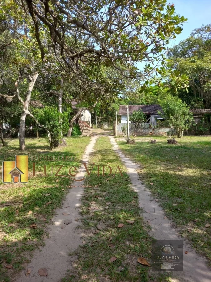 Venda dessa área com casas dentro